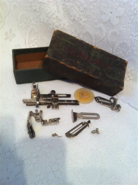 Antique Singer sewing machine accessories in original by candyzown