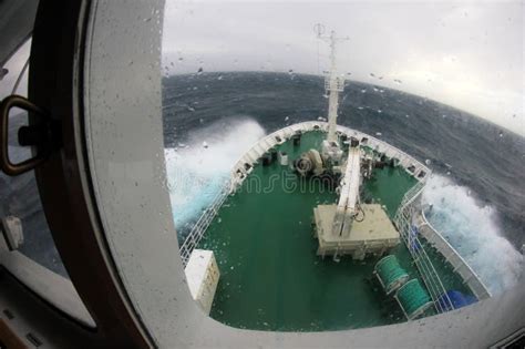 Ship`s Bow Diving into a Big Splashing Wave, Antarctica Stock Image ...