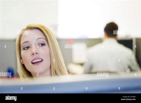 Office Worker Peering Over Cubicle Wall Photo Stock Alamy