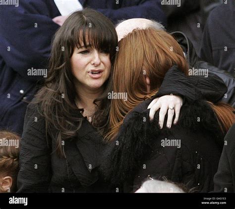 Phil Odonnells Wife Eileen Hugs Her Daughter After The Funeral Of The