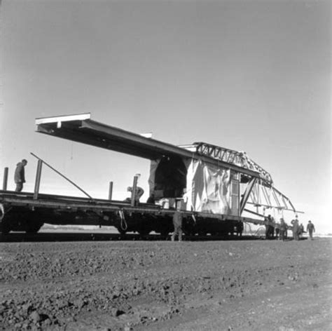 Railroad bridge construction, part of the bridge being moved ...