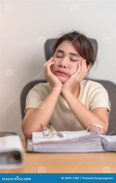 Stressed Asian Woman Having Tired And Sleepy While Working Female