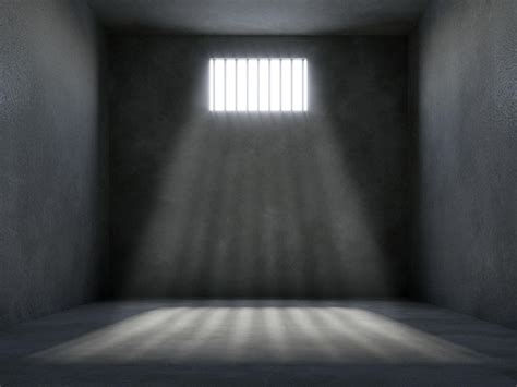 Premium Photo Prison Cell With Light Shining Through A Barred Window