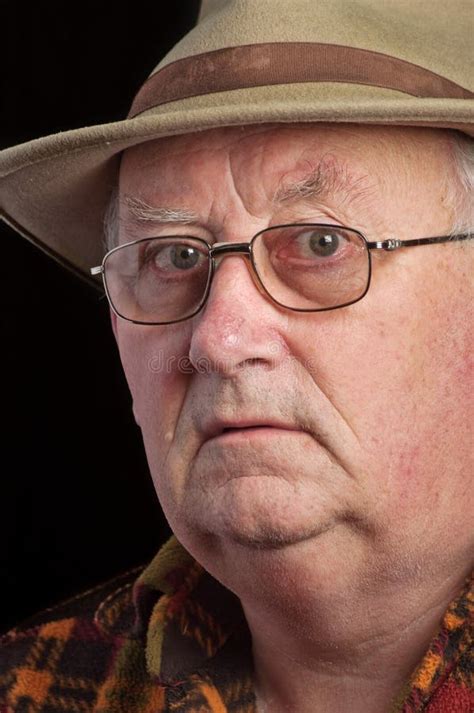 Portrait Of A Senior Elderly Old Man Wearing Camouflage Clothing And