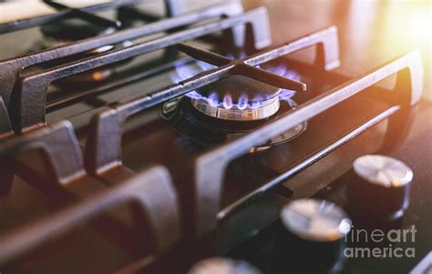 Gas Flames Burning On Kitchen Stove Top Photograph By Michal Bednarek Pixels