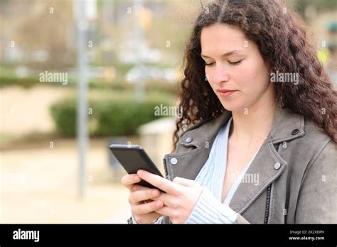 Person And Texting Adult Serious Street Hi Res Stock Photography And