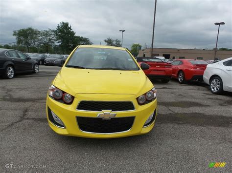 Bright Yellow Chevrolet Sonic Rs Hatchback Photo