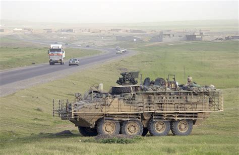 A US Army (USA) M1126 Stryker Infantry Carrier Vehicle (ICV) with Slat ...