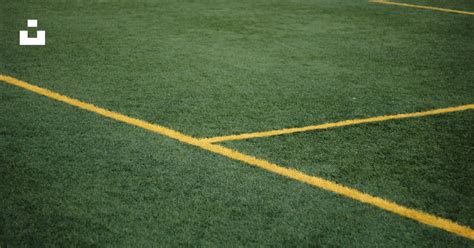 Green and white soccer field photo – Free 50mm Image on Unsplash