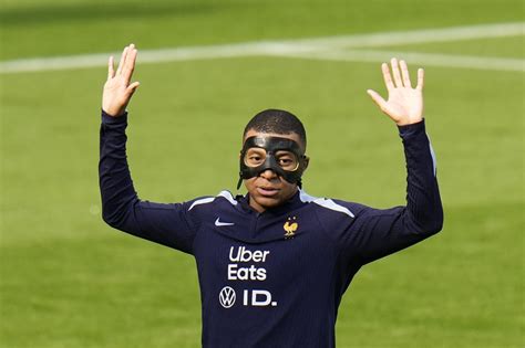 Kylian Mbappé is getting used to his new mask ahead of France s game