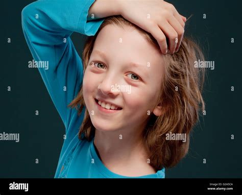 Portrait Of A Boy With Blond Hair Smiling Stock Photo Alamy