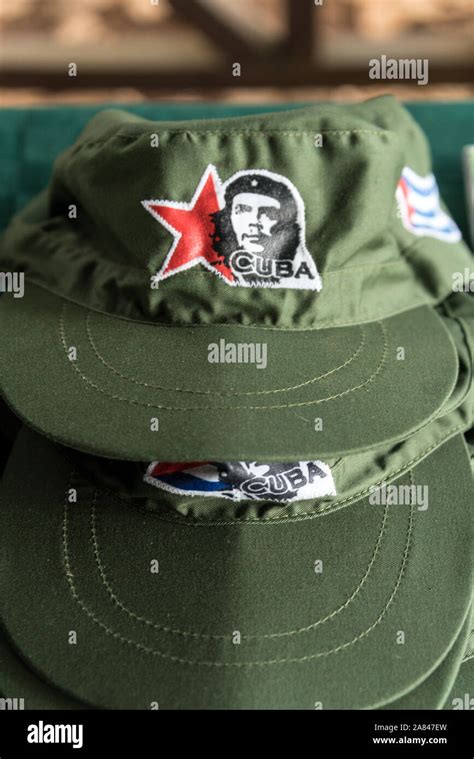 A Stack Of Cuban Hats With The Badge Of Che Guevara On Sale At A