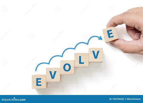 EVOLVE Word Made With Wooden Blocks Concept Stock Photo CartoonDealer