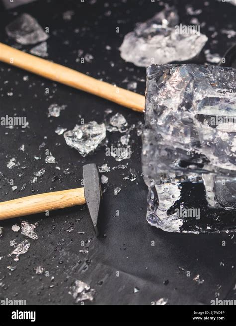 Process Of Breaking The Ice With Hammer And Ice Pick Group Of People