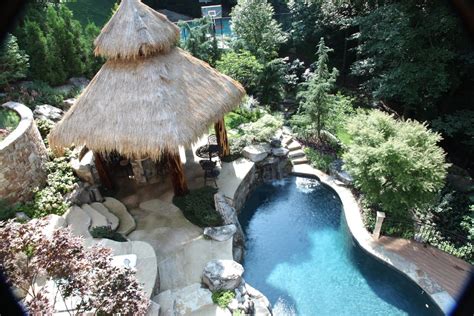 A Terraced Backyard Frames This Beautiful Pool Featuring Boulder