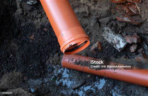 Repair Of Sewer Drain With Strong Pipe Stock Photo - Download Image Now ...