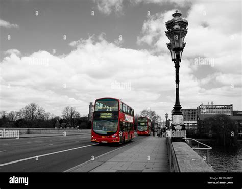 Big red London bus on black and white background Stock Photo - Alamy