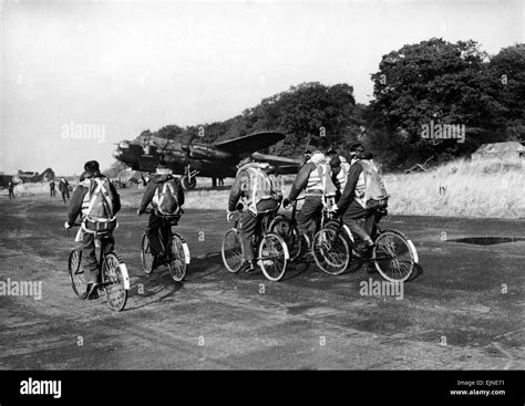 Images Believes To Show Aircrew Members Of The 106th Bomber Squadron Seen Here Cycling To Their