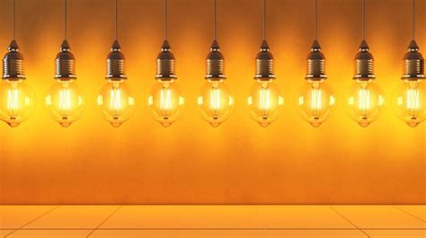 Premium Photo Vintage Light Bulb On Yellow Wall Background 3d Rendering