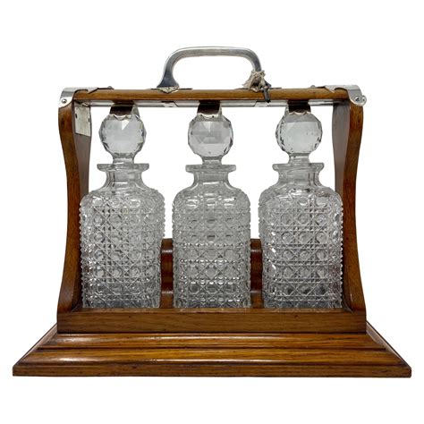 Antique English Decanter Set And Stand Tantalus At 1stdibs Antique Tantalus Decanter Set