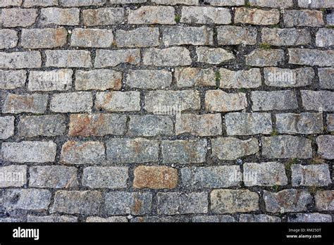 Gray brick road - background texture Stock Photo - Alamy