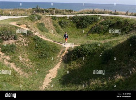 Shell Craters From Allied Artillery Barrage At Pointe Du Hoc During