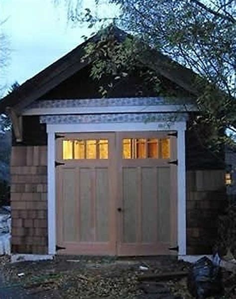 Fiberglass Swing Out Garage Doors | Non-warping patented wooden pivot door, sliding door, and ...