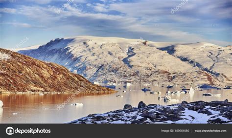 Iceberg floating in greenland fjord Stock Photo by ©the_lightwriter 159954060