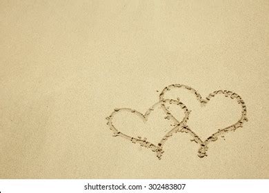 Two Hearts Sand On Beach Stock Photo Shutterstock