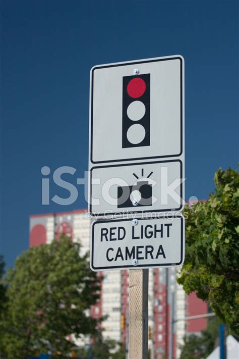 Red Light Camera Sign Stock Photo | Royalty-Free | FreeImages