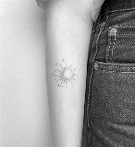 Fine Line Sun And Moon Tattoo On The Inner Forearm