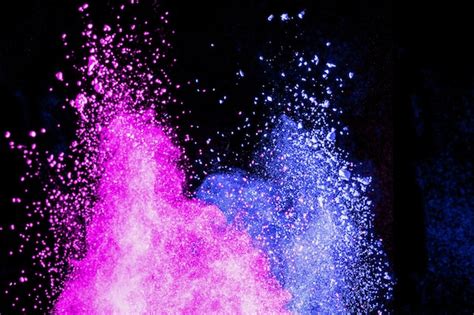 Premium Photo Multicolored Powder Explosion On Black Background