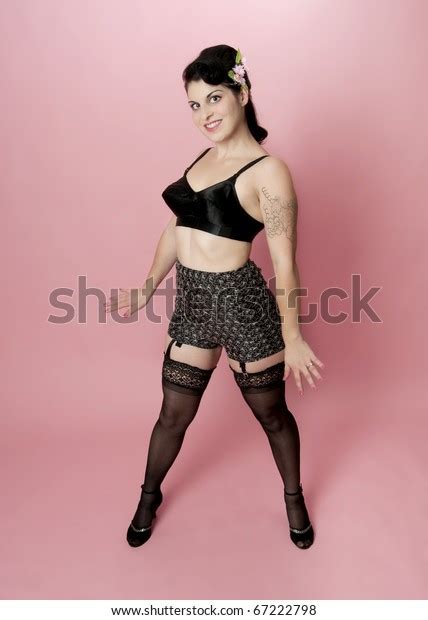 Sexy Pinup Model In Vintage Lingerie