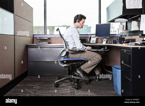 Caucasian Man Working In An Office Cubicle Stock Photo Alamy