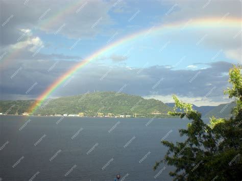 Premium Photo | Rainbow over the lake Iron Gates on Danube in Orsova
