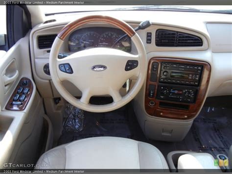 Medium Parchment Interior Dashboard for the 2003 Ford Windstar Limited #54170074 | GTCarLot.com