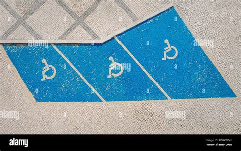 Handicap symbol on parking space. Disability car parking sign ...