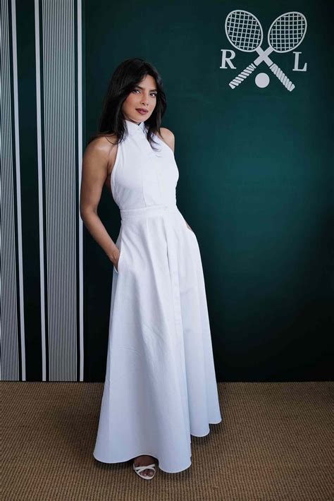 Priyanka Chopra Dons A Bikini And Kisses Nick Jonas On The Beach