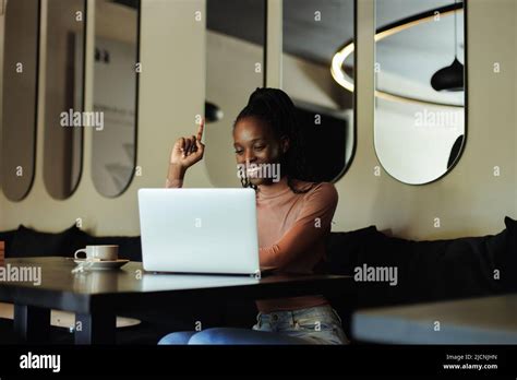 Multicultural Smiling Afro American Woman Work With Laptop And Drink