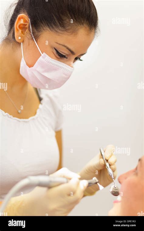 Female Dentist Working On Patient Stock Photo Alamy