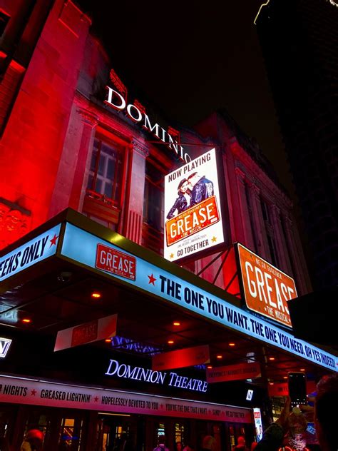 Image Of Dominion Theater In London Lit Up In Red Theres An Ad For