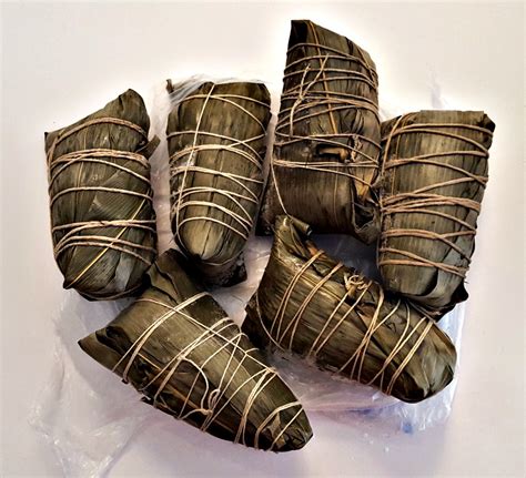 Joong: Chinese sticky "rice dumplings" wrapped in bamboo leaves - stuarte