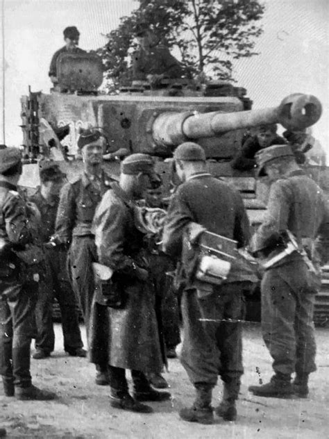 Tiger I 302 From S Pz Abt 502 And Panzer Crewman And Infantry On The