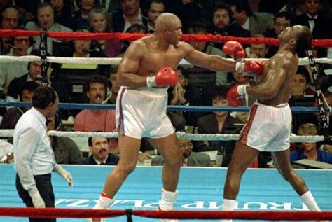 George Foreman Snaps Back The Head Of Evander Holyfield Boxing History George Foreman Evander