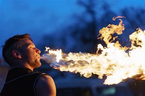 Fireman Blowing Flames Stock Photo Download Image Now Istock