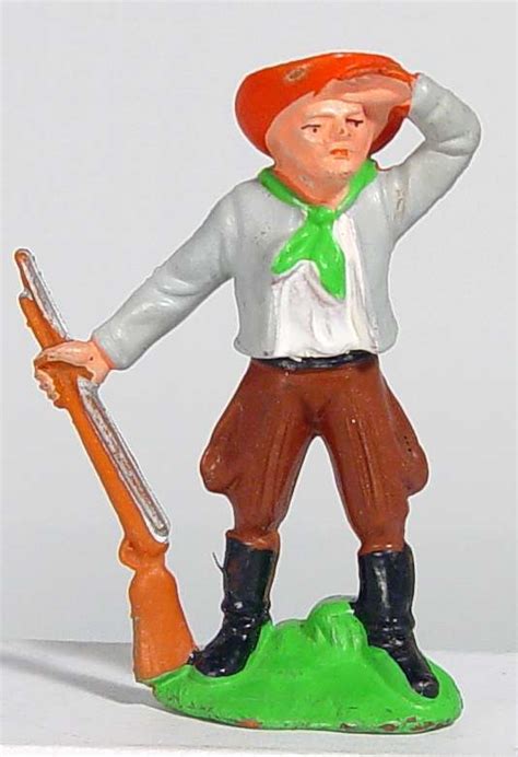 Bayer Cowboy spähend mit Gewehr germantoys de