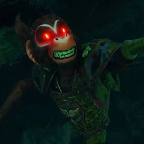 an animated character with glowing red eyes and green hair is in the dark, holding his arms out