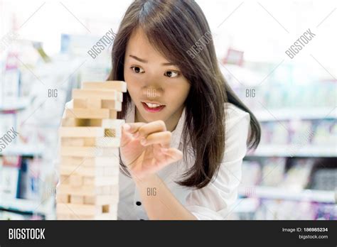 Asian Lady Play Jenga Image And Photo Free Trial Bigstock