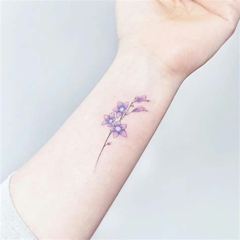 Purple Flower Design Tattoo