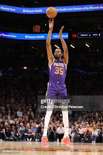 Kevin Durant Of The Phoenix Suns Puts Up A Shot Against The Minnesota